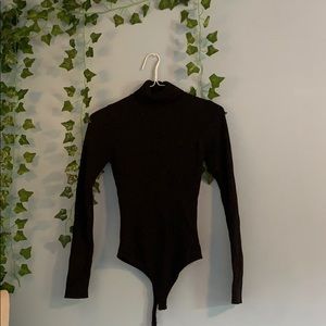rubbed black turtleneck bodysuit